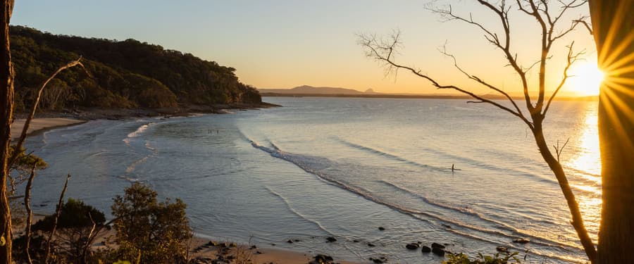 Sunrise over a quiet stretch of the Queensland coast